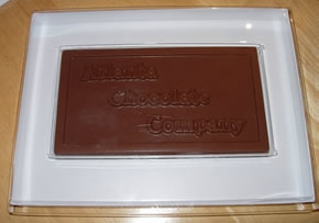 We have special packaging available for presenting your custom chocolate bars to your recipients, these boxes are designed so you can include custom decoration or additional information inside the box.